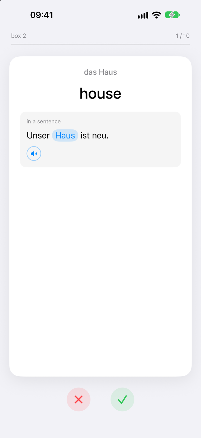 The same card flipped over, showing the English meaning 'house' and an example sentence with 'Haus' highlighted.